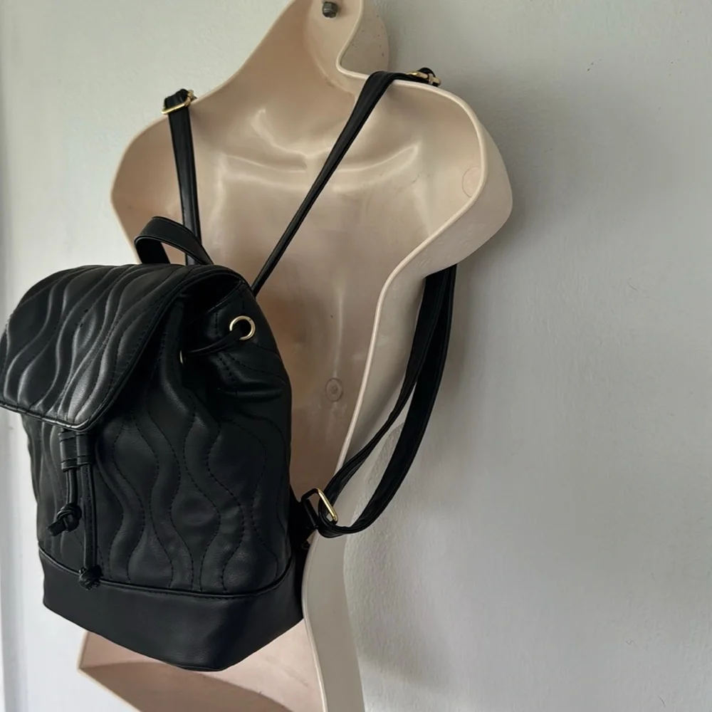 Alexis Bendel black quilted vegan leather adjustable backpack
